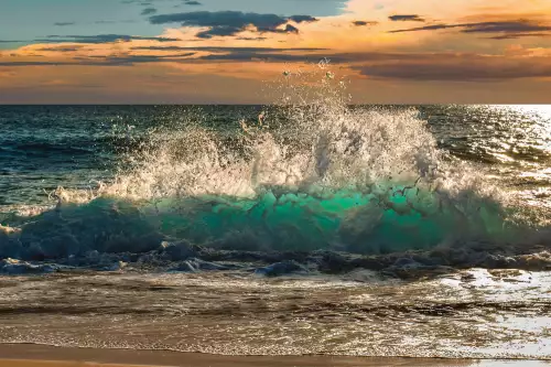 Wave crashing on the beach 